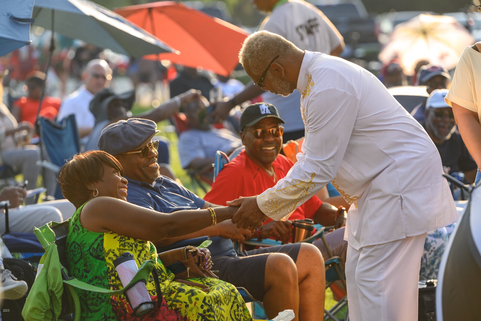 John E. Lawrence saying hello to concertgoers at the Summer Jazz series.