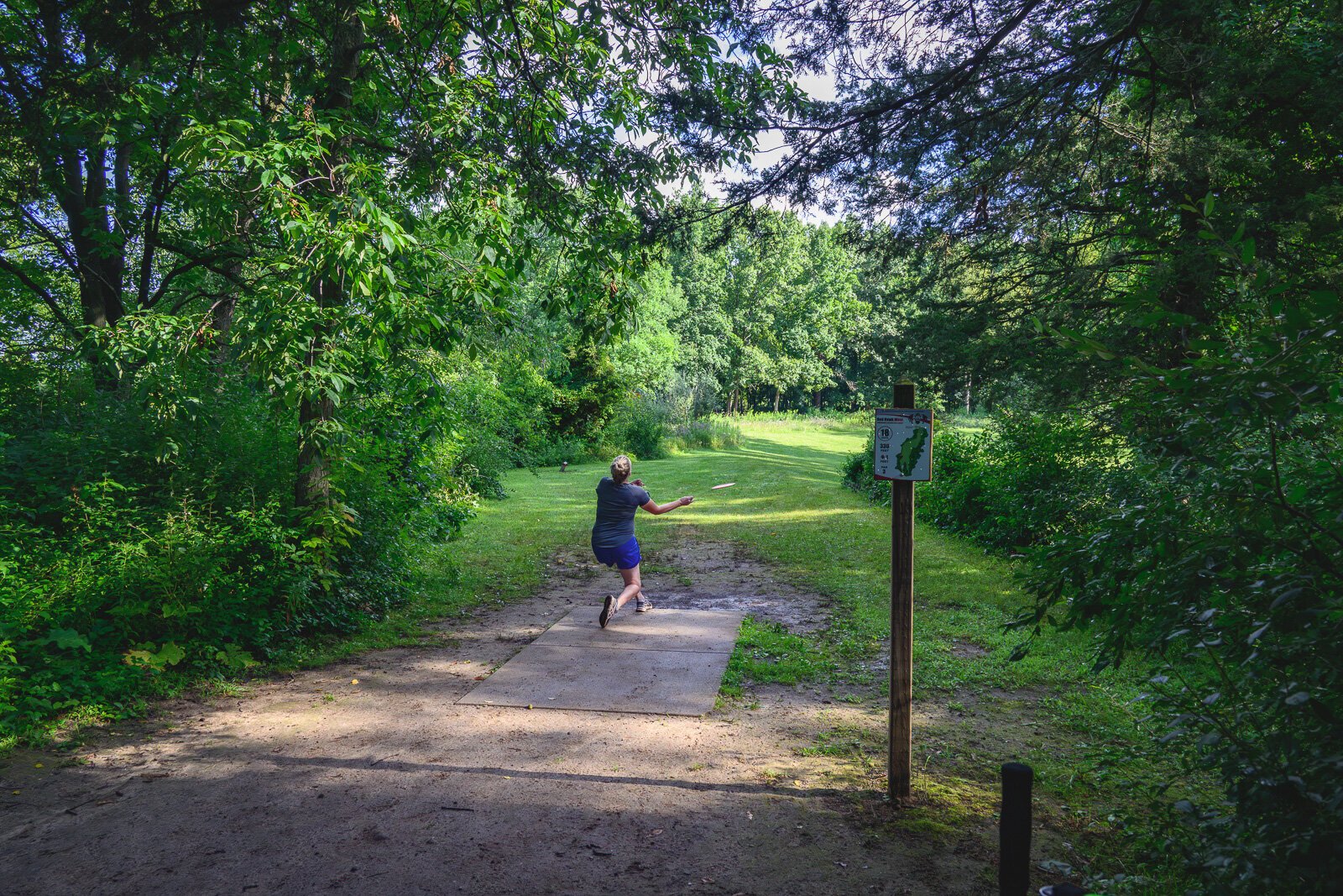 Jennifer Trombley and friends playing at Red Hawk Disc Golf Course at Independence Lake County Park.