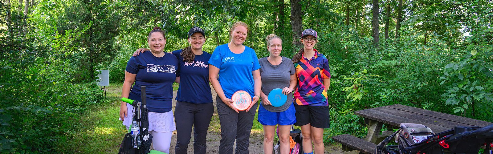 Sarah O'Leary, Katie Bramble, Jennifer Trombley, Audrey Griffith, and Jordyn Harriger playing at Red Hawk Disc Golf Course at Independence Lake County Park.