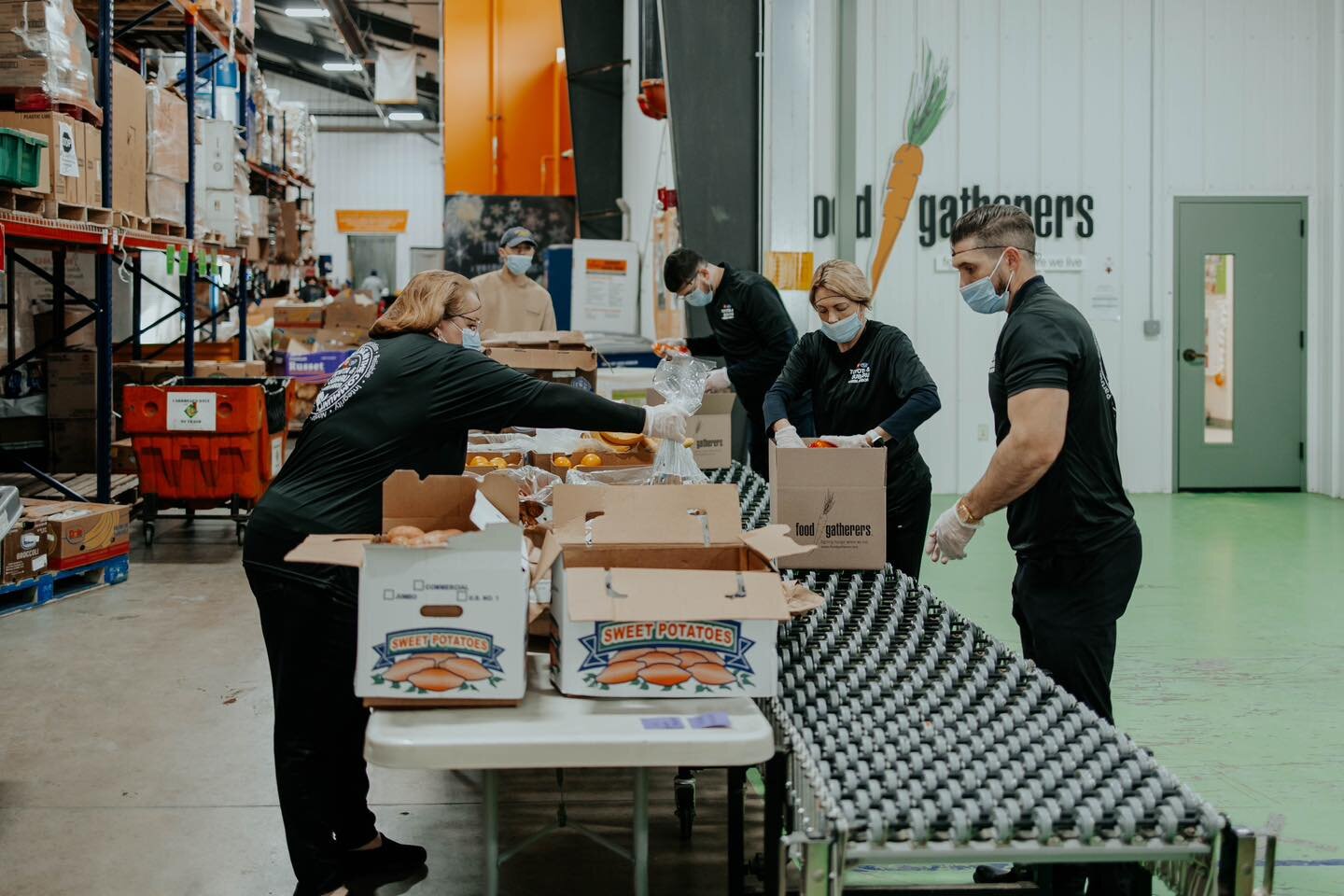 Volunteers work at Food Gatherers.