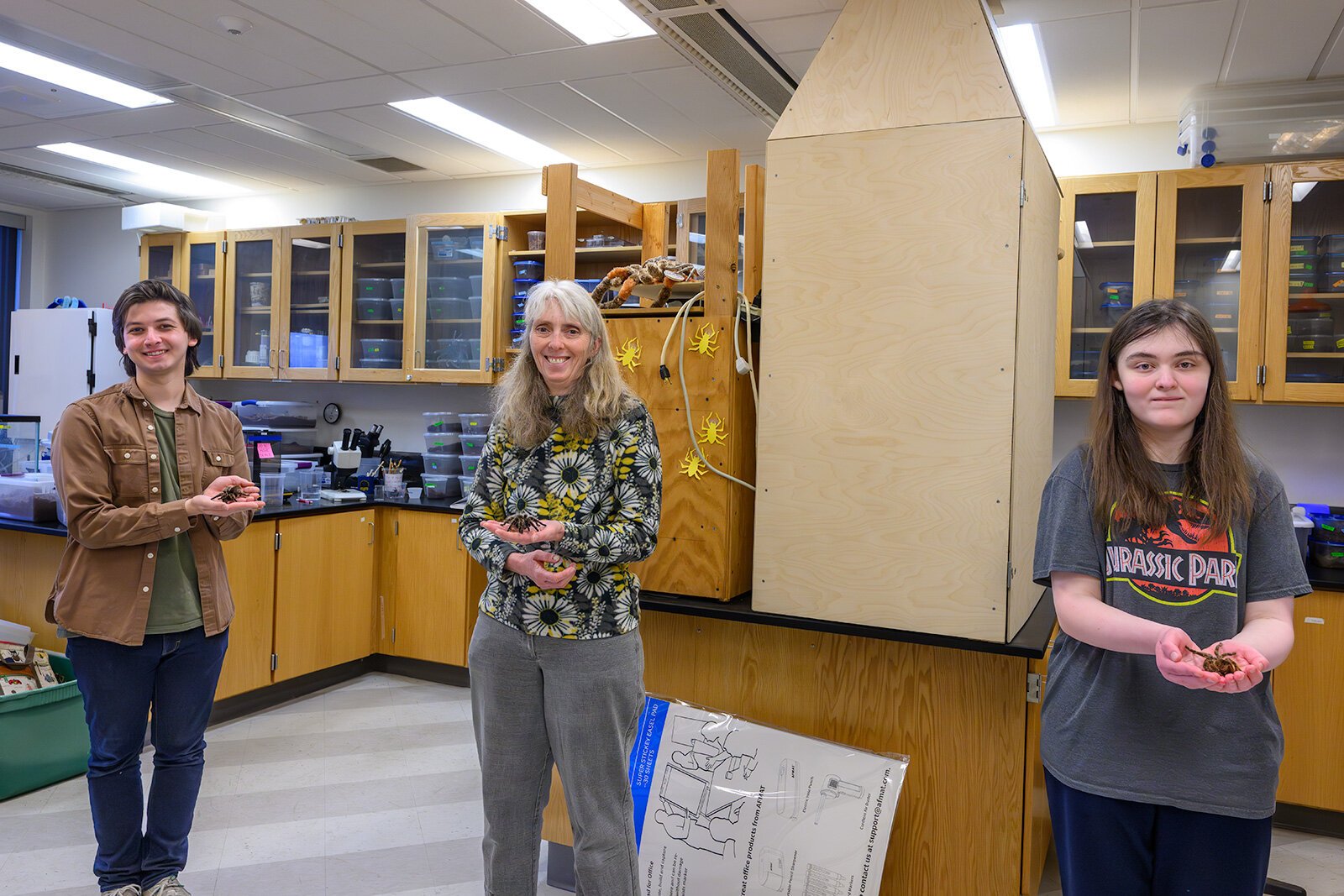 Bradley Allendorfer, Dr. Cara Shillington, and Nicole Zuraw at the EMU tarantula lab.