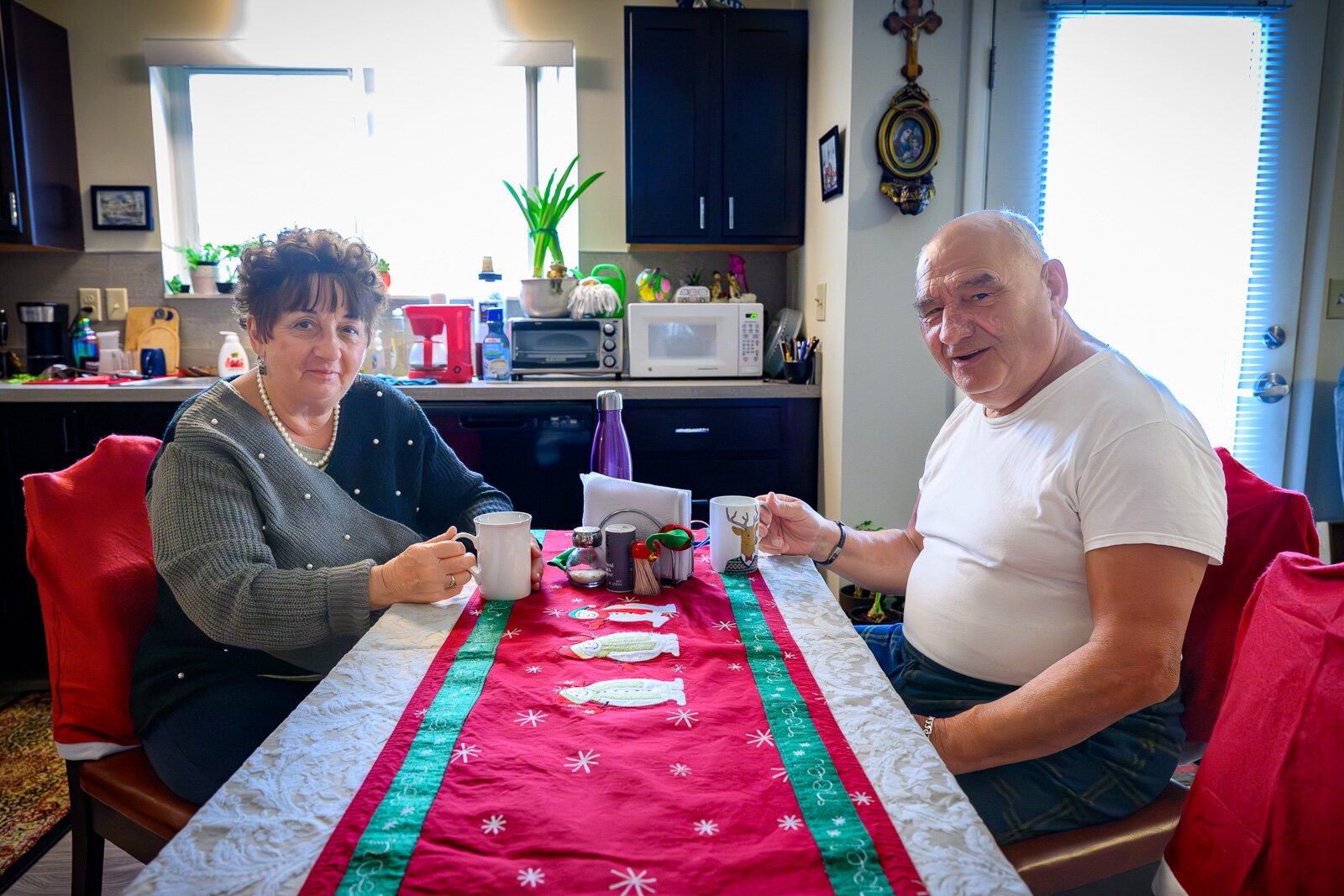 Maria Munteanu and her husband Vasile Munteanu in their apartment at Hilltop View Apartments.