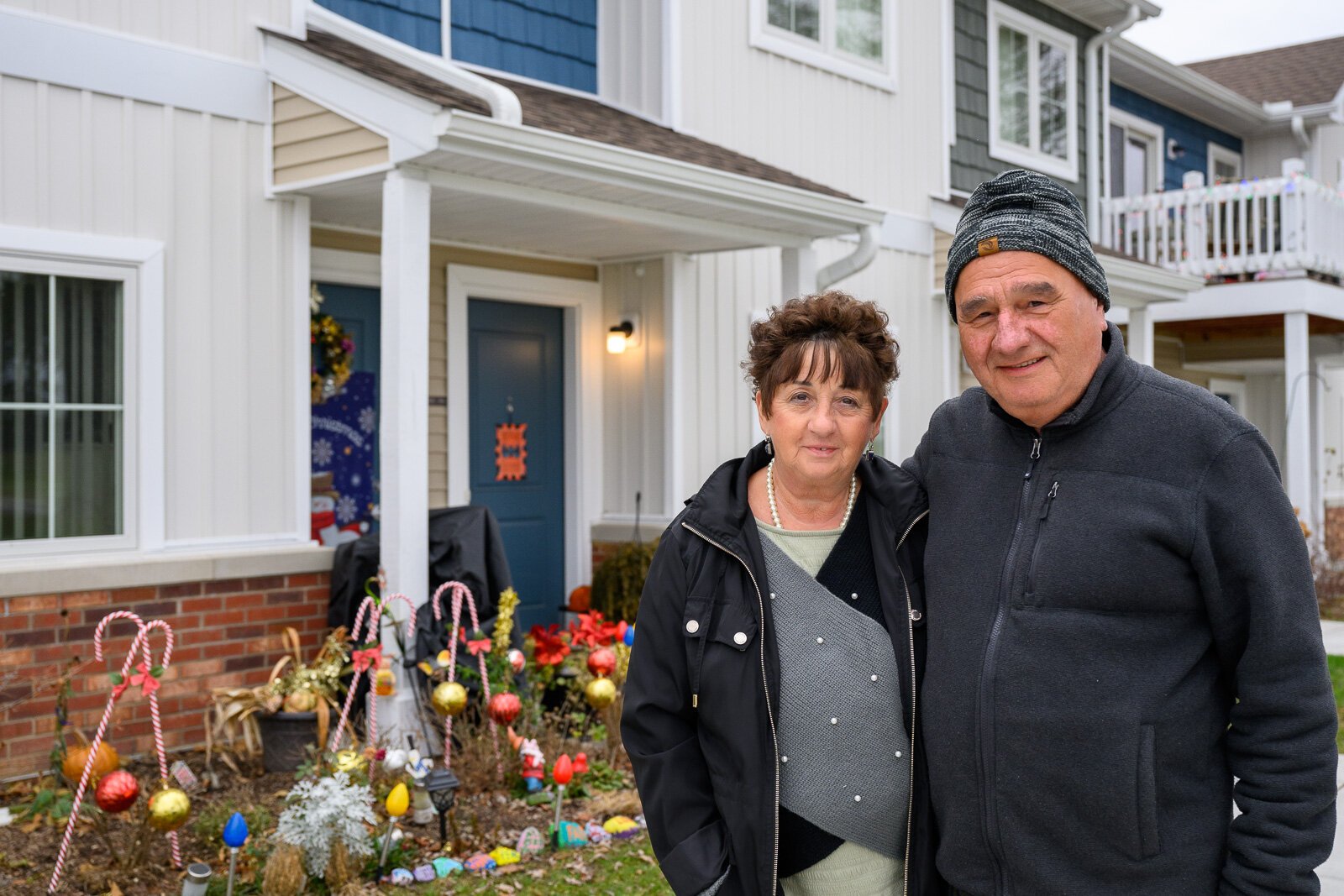 Maria Munteanu and her husband Vasile Munteanu outside their apartment at Hilltop View Apartments.