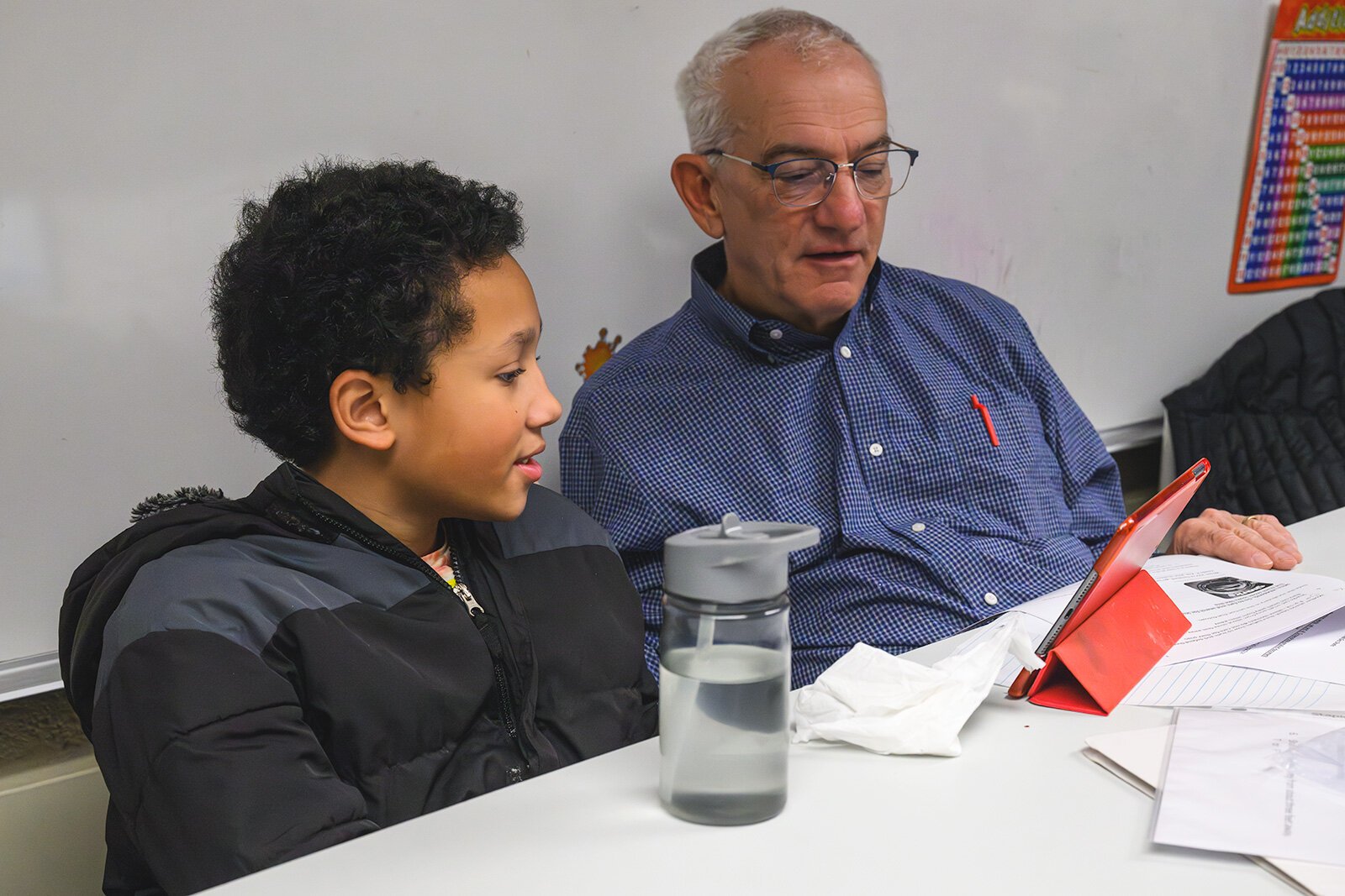 Tutors working with students at Erickson Elementary in Ypsilanti.