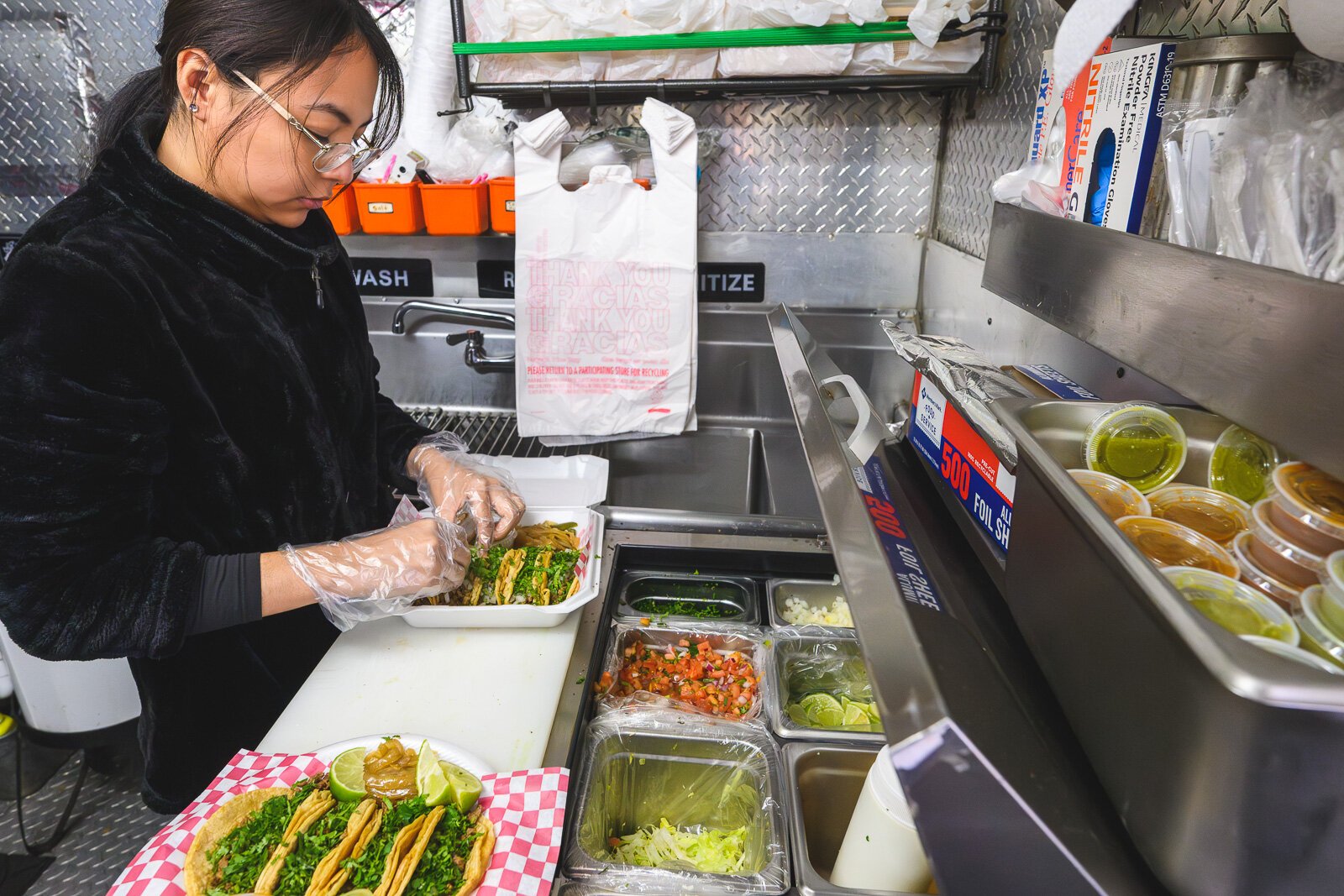 Jennifer Guicho preparing tacos at Don Guicho's Kitchen.