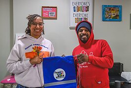 Tiana Haygood (left) at Feed The Need Sensory Zone at Unique Care Connect Community Center.