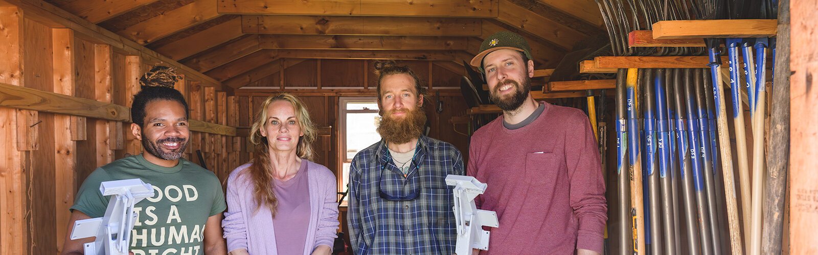 Julius Buzzard, Rebecca Mackey, Christopher Hallett, and Doug Reith at Growing Hope's tool lending library.