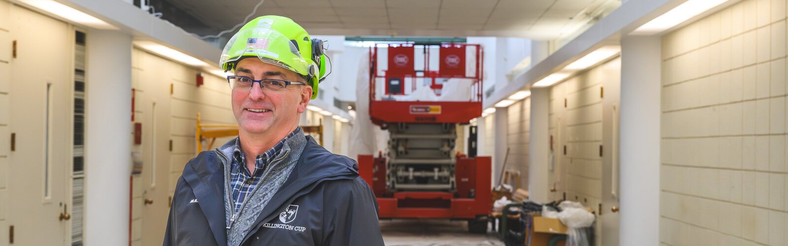 MI-HQ President Mark Smith at the former EMU Gary Owen College of Business under renovation.