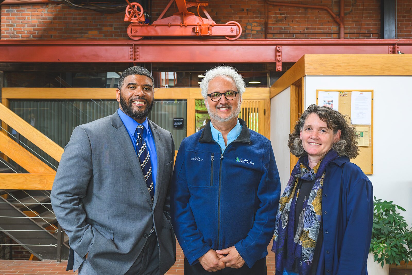 Aaron Cooper, Michael Appel, and Wendy Carty-Saxon at Avalon Housing's offices.