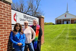 Washtenaw County Office of Community and Economic Development Director Toni Kayumi, Manchester Mayor Pat Vailliencourt, and Manchester United Methodist Church Pastor Susan Hitts at Manchester United Methodist Church, site of Manchester's senior café 