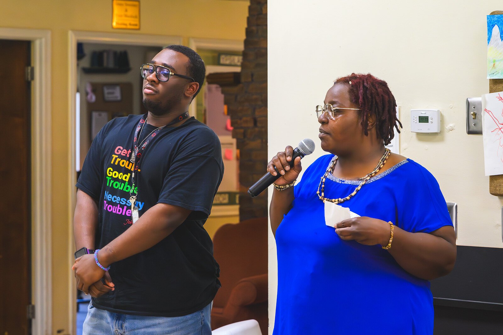 Jordan Dorsey being honored by Educate Youth youth advocate Bonita Fultz at the Educate Youth graduation celebration.