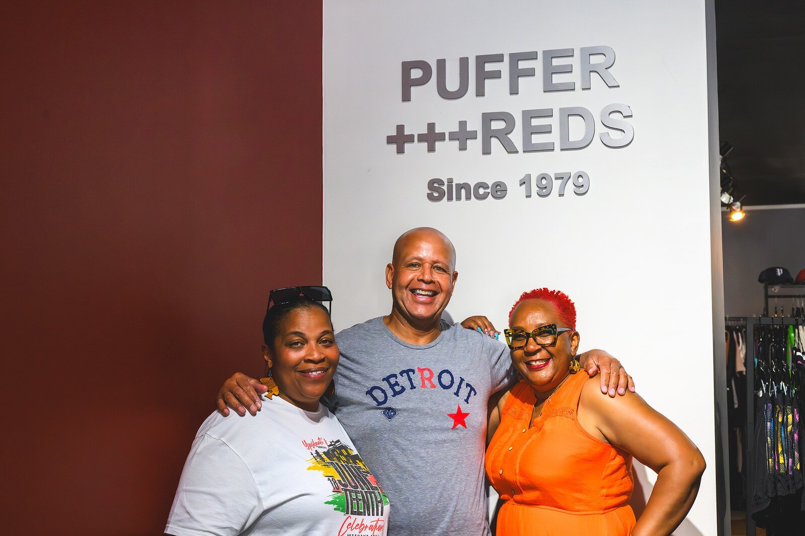 Trisché Duckworth, Puffer Reds owner Eric Williams, and Cherisa Allen at Puffer Reds.