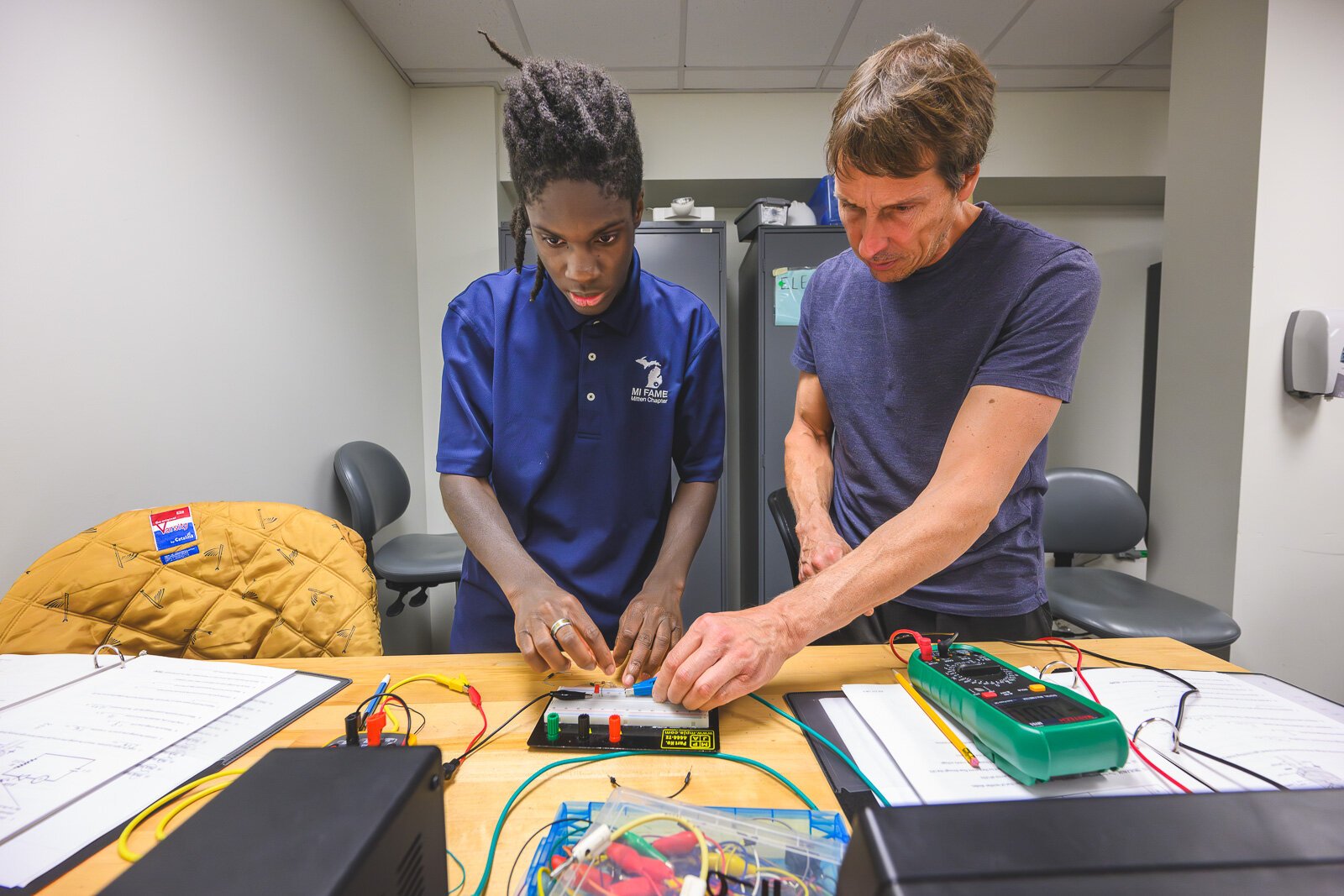 FAME program student Darrius Johnson (left) and Mike Ozerdier in Basic Electronics class at WCC.