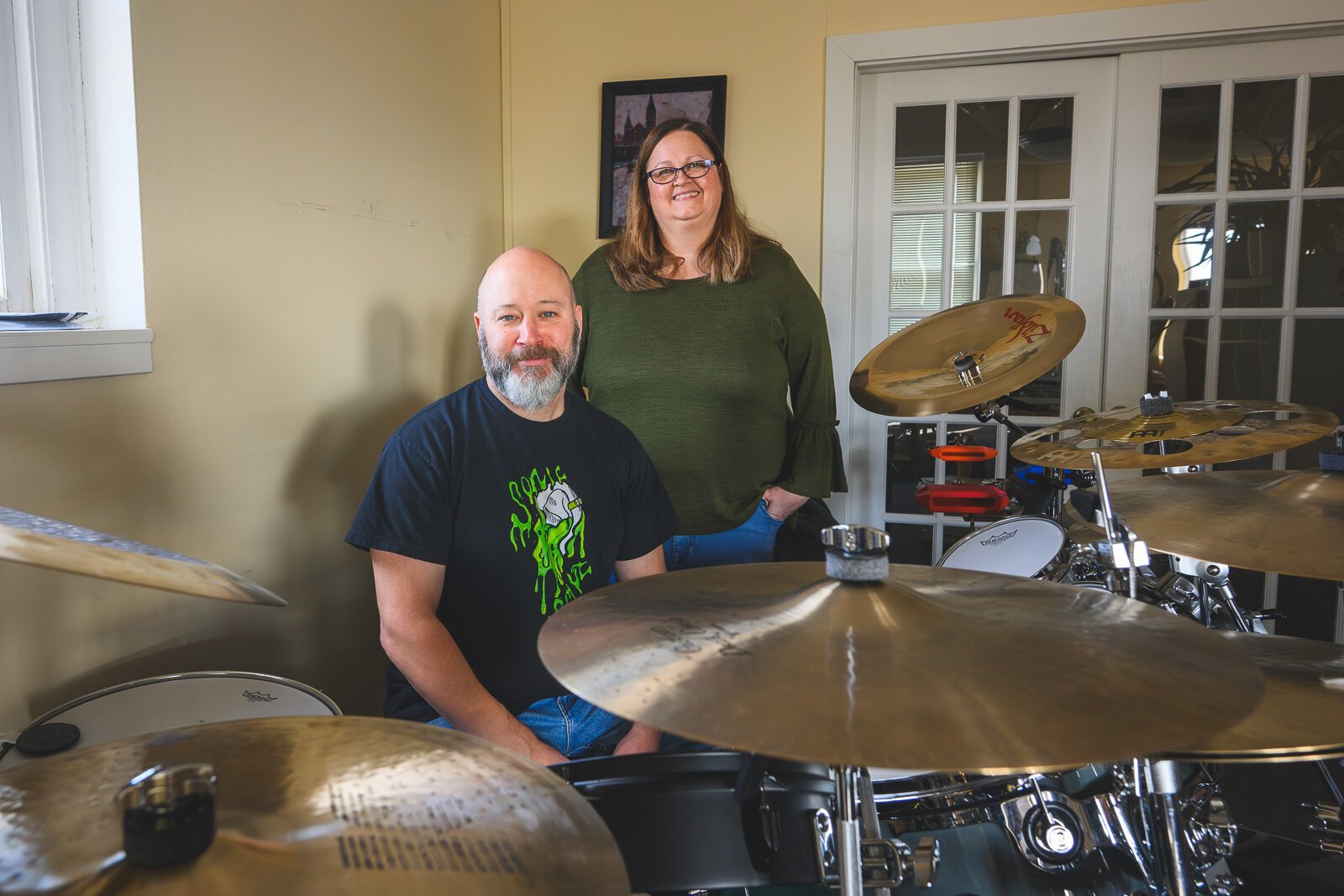 "The Drumbeat with Josie and Pete" podcast hosts Peter Martel and Josie Ann Lee