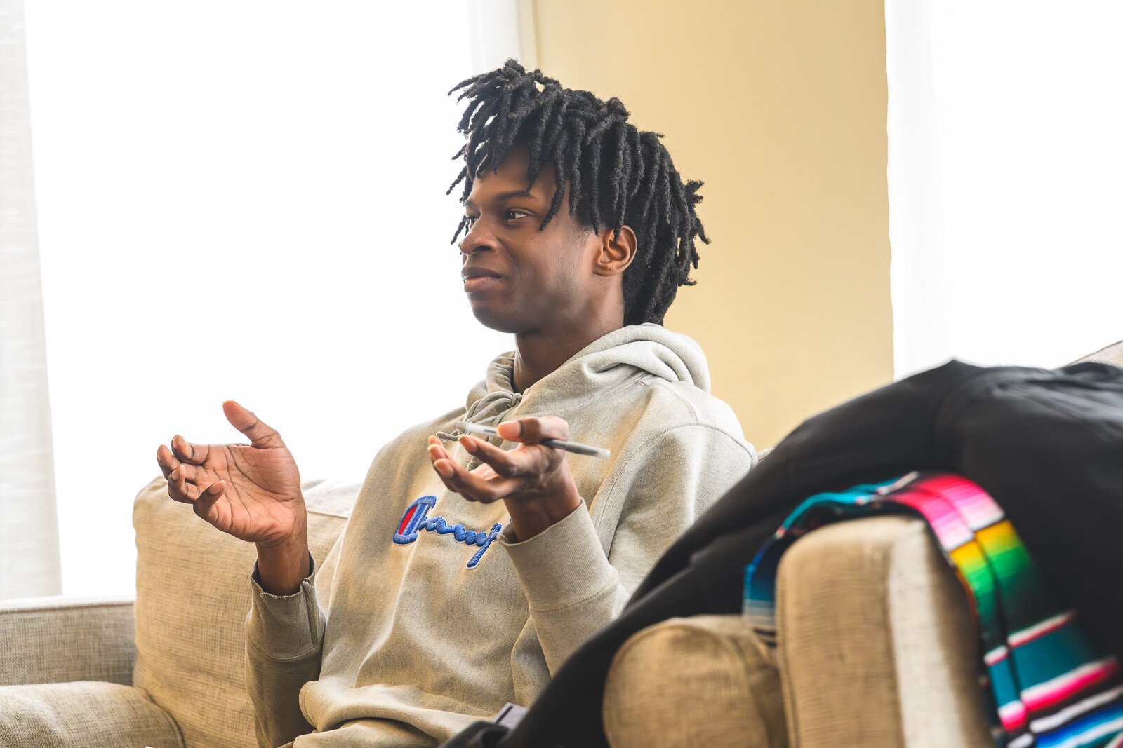 An EmpowerED High School student at a poetry discussion at Dzanc House.