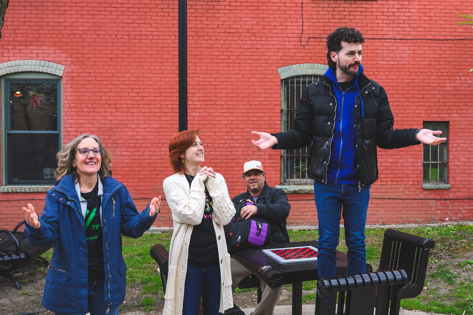 AngelicKrisBrent Miller speaking before the Great Day in Ypsi photo shoot.