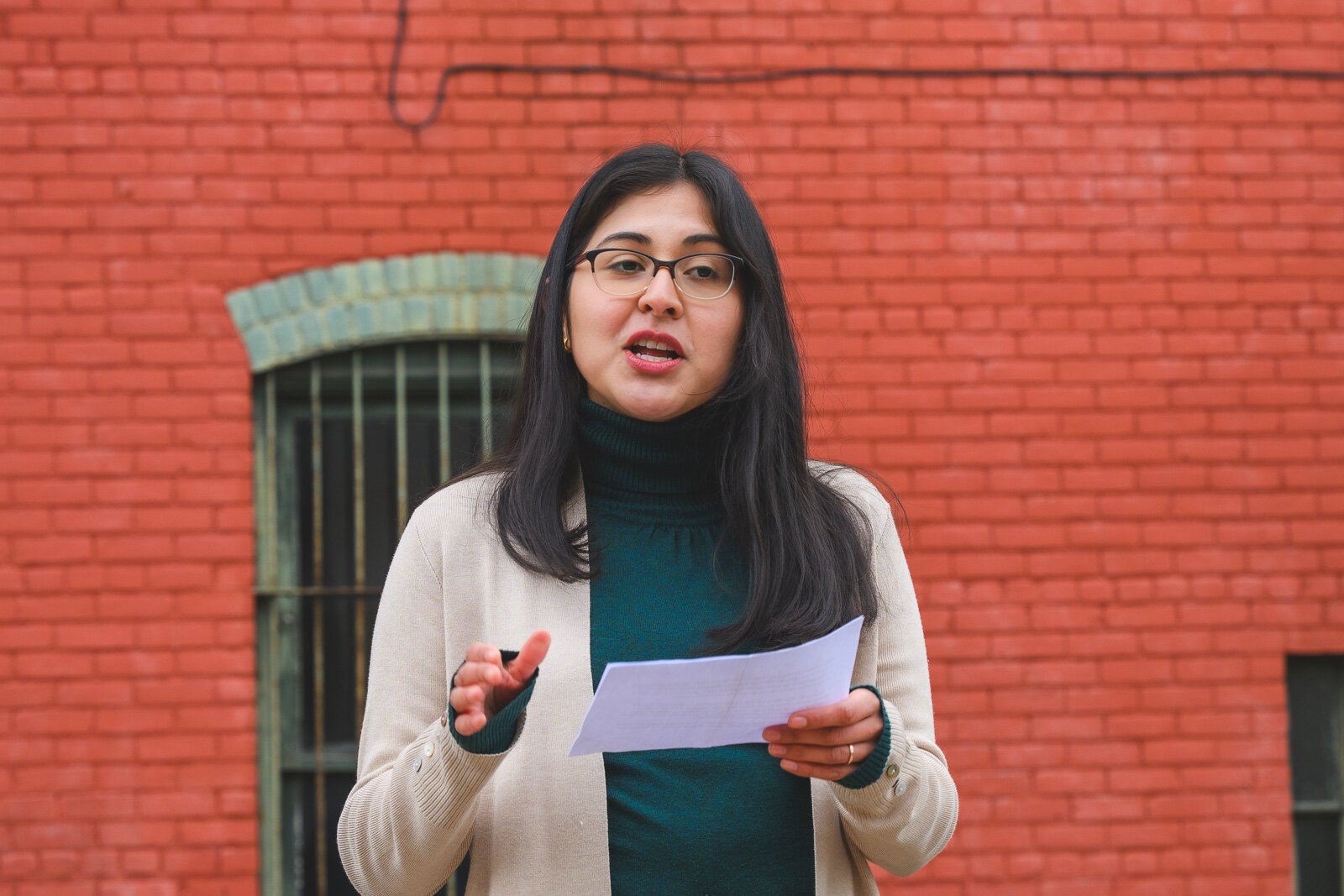 Angelica Esquivel speaking before the Great Day in Ypsi photo shoot.