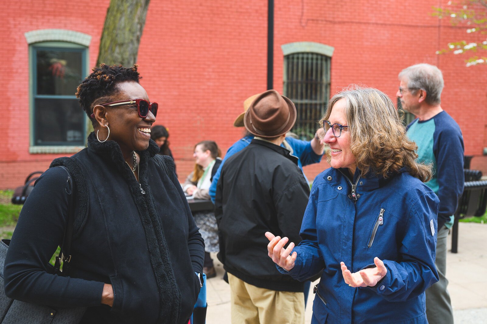 People gathering at the Ypsilanti District Library Michigan Avenue branch before A Great Day in Ypsi photo shoot.