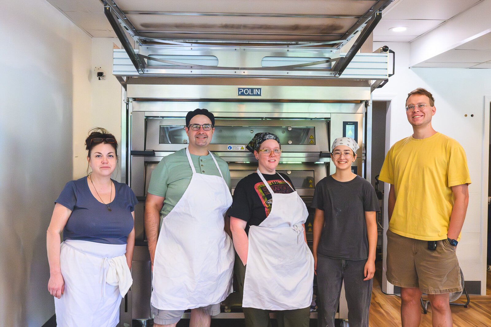 Danielle Bartholomew, Benjamin Brown, Elle Gibbons, Marissa Muller, and Aaron Greunke at B-Cubed Bakery.