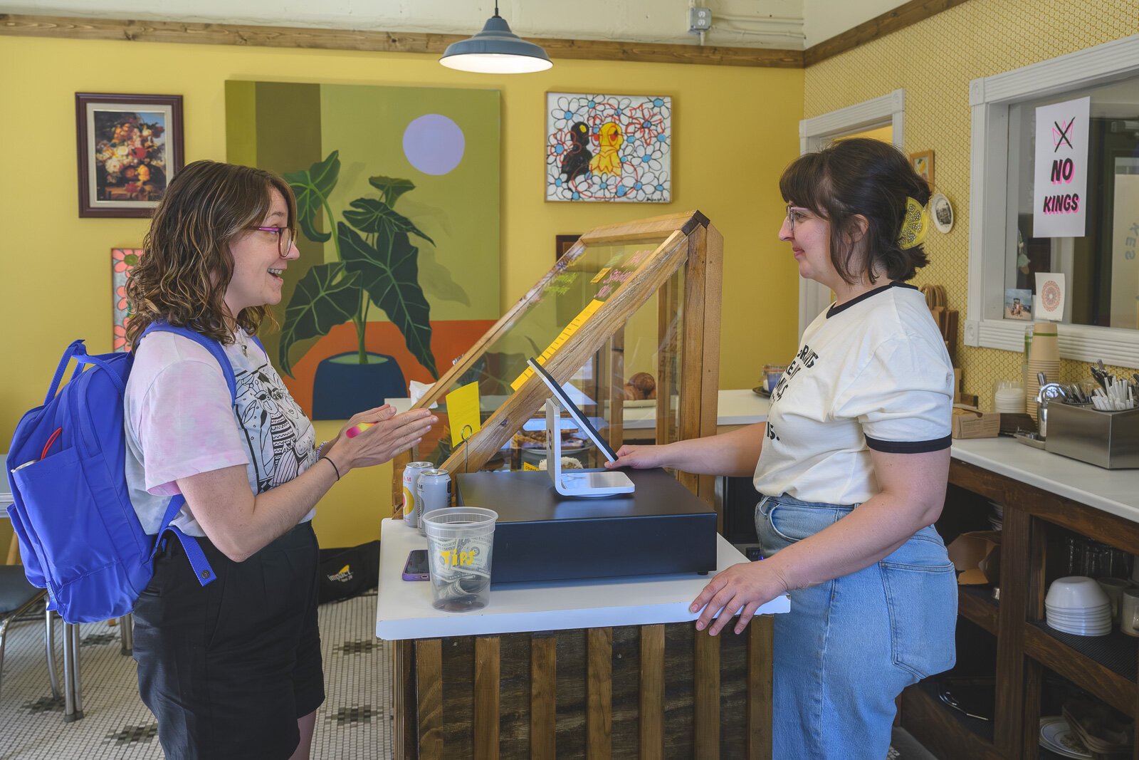 Amanda Moore placing an order with Franny Valdez at Beara Bakes.