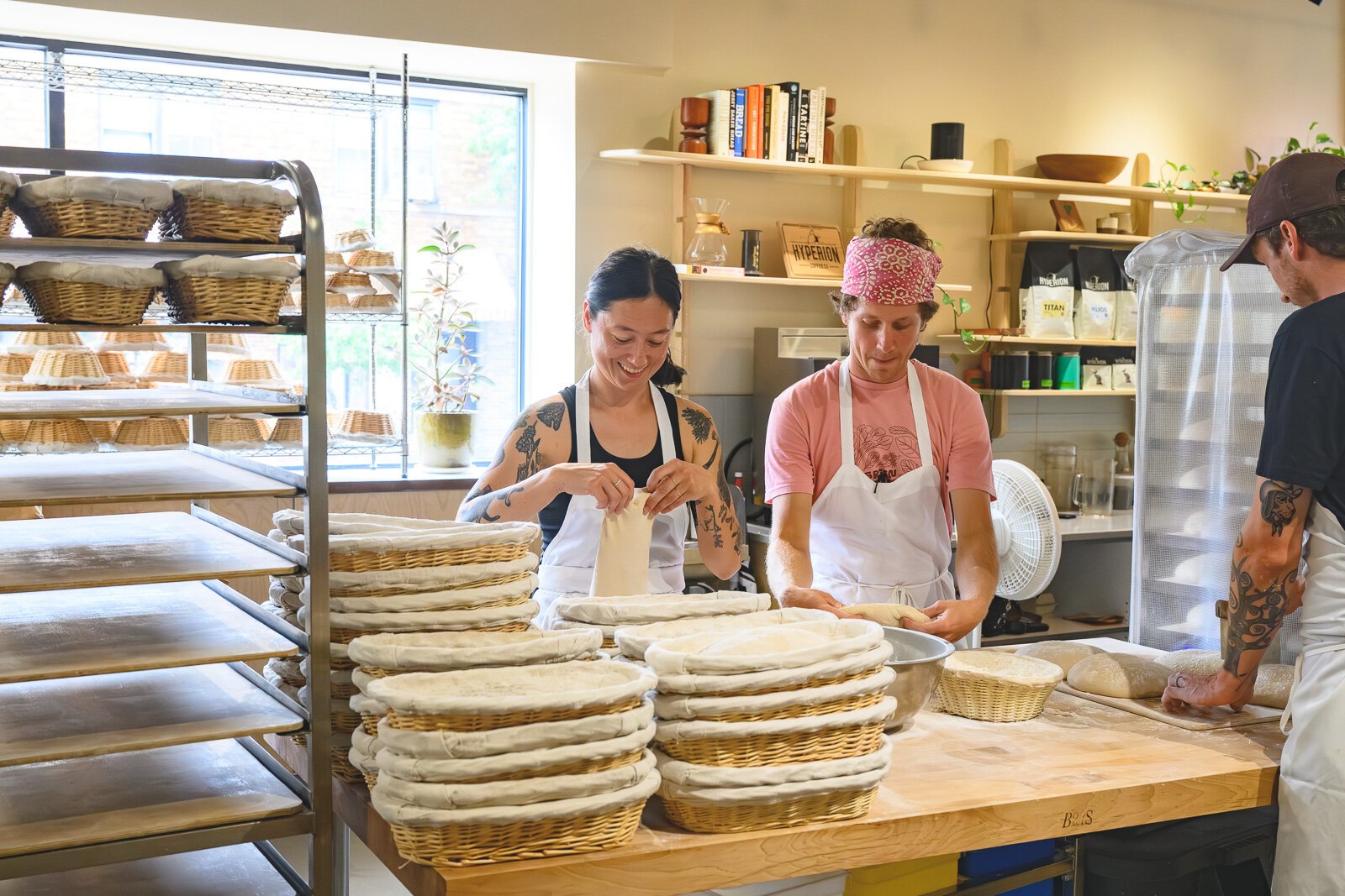 Jennifer Haglund and an employee in the kitchen at Bird Dog Baking.