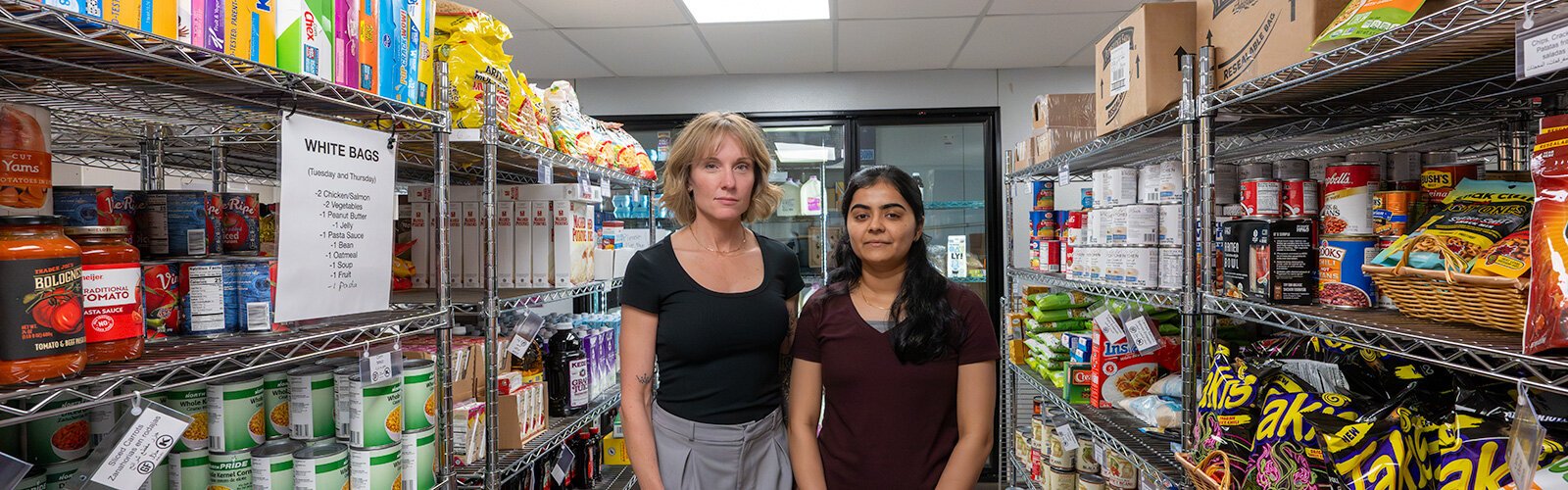 Christine Taylor, senior director of community assistance and nutrition services at Ann Arbor's Jewish Family Services (JFS); and Bhakti Javiya, an AmeriCorps VISTA economic empowerment associate at JFS.
