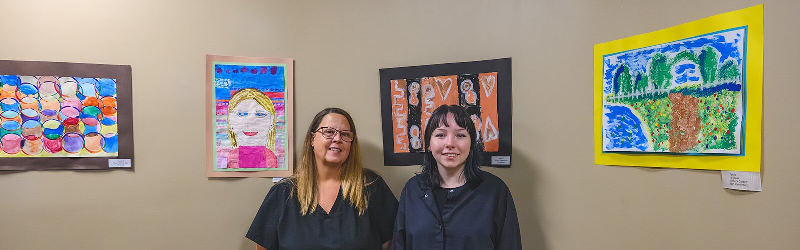 Patient Service Representatives Kathy Craven and Amanda Haydt at the Trinity Health Haab Health building's dental clinic.