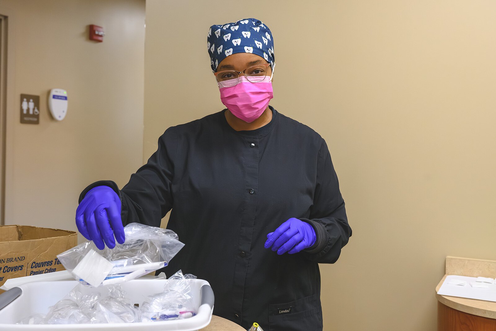 Dental Assisant Tashia Calloway at the Trinity Health Haab Health building's dental clinic 