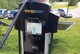 An electric vehicle charging station outside the Michigan Energy Office in Lansing.