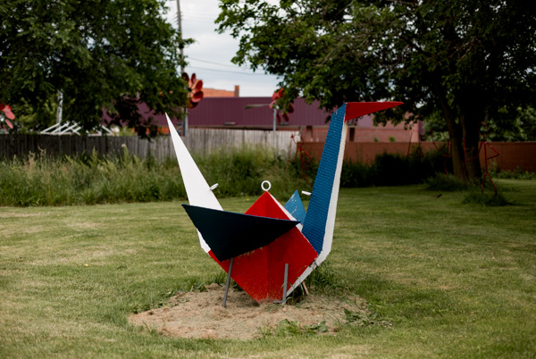 A metal crane meant to resemble origami