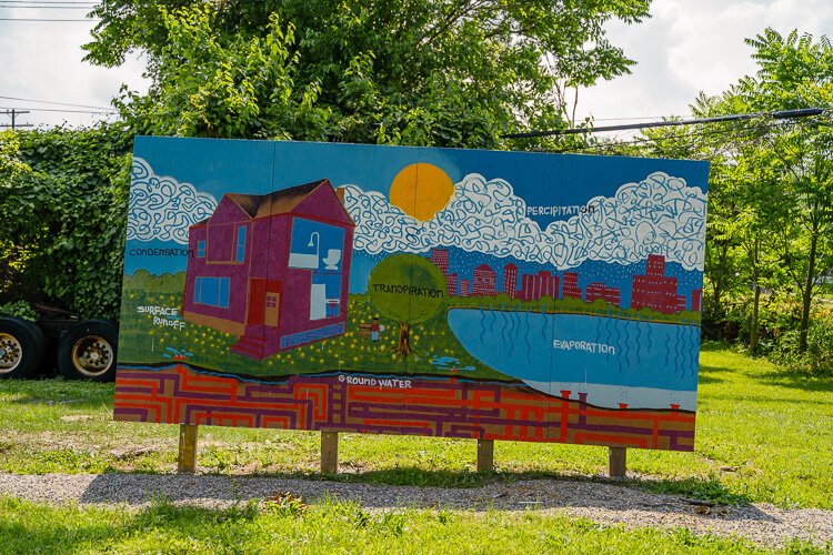 A mural at the Hamilton Rainscape in Chandler Park.