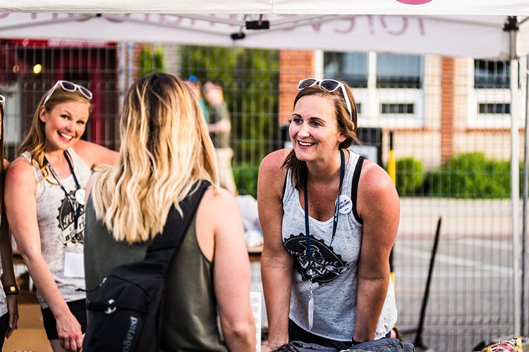 Annie Sanders volunteering at the Mt. Pleasant Craft Beer Festival. 