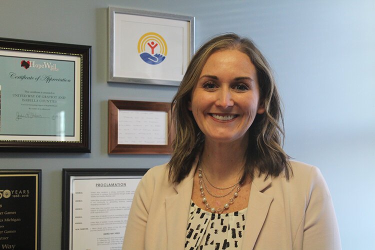 Annie Sanders poses in her office at United Way of Gratiot & Isabella Counties. 