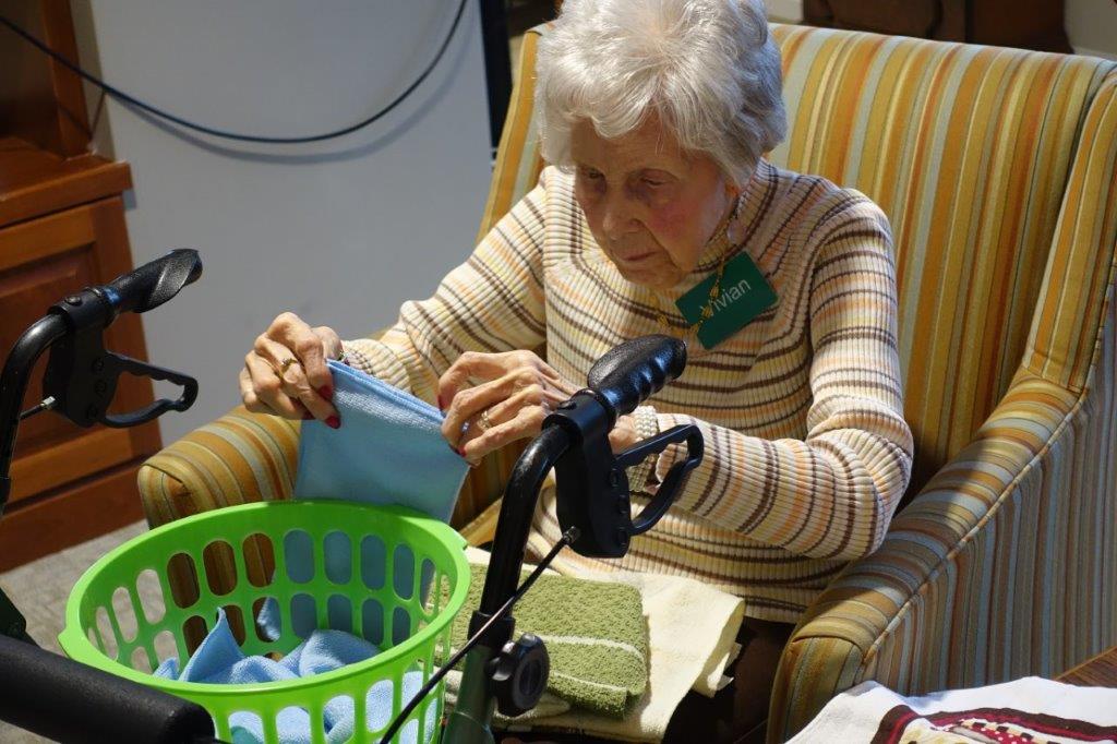 Montessori activities can include simple chores like folding laundry