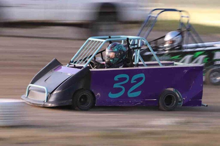 Ella Bringer races her mini wedge car during the 2021 racing season at the Mt. Pleasant Speedway.