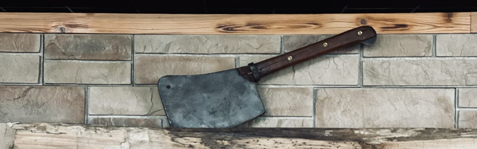 Wood Shop Social's entryway is appropriately adorned with a large axe.