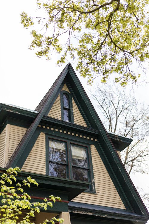 Triangles are a recurring shape at 117 Fancher, created by the roof and continued as tessellations on the front of the home.