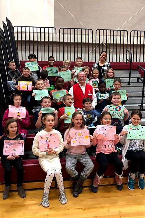 Grandpa Rick, a foster grandparent, and his class.