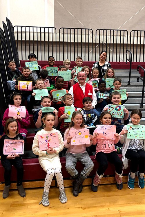 Grandpa Rick, a foster grandparent, and his class.