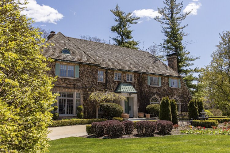 711 South Fancher stands behind a sprawling landscape and horseshoe driveway. Michelle Sponseller says the home was originally owned by William Harris of the Harris Milling Company and featured a mill run by energy from the Chippewa River dam.