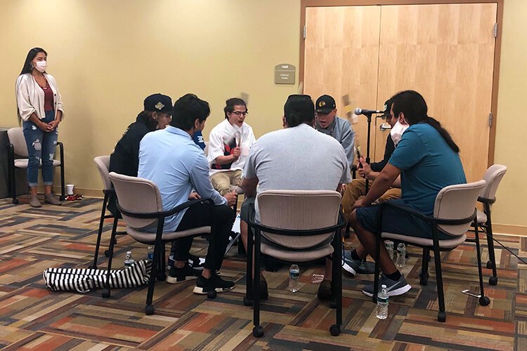 The Onion Creek Drummers perform a traditional Native song to open the Honoring Indigenous People's Day event.