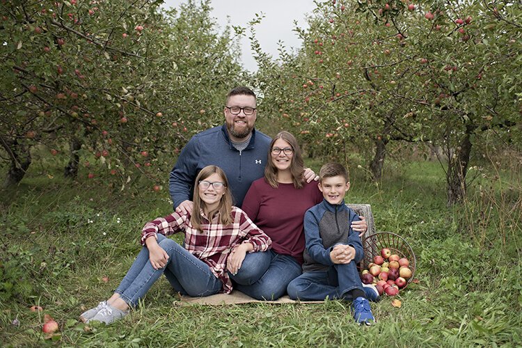 Riley and Jennifer Justis with their two children.