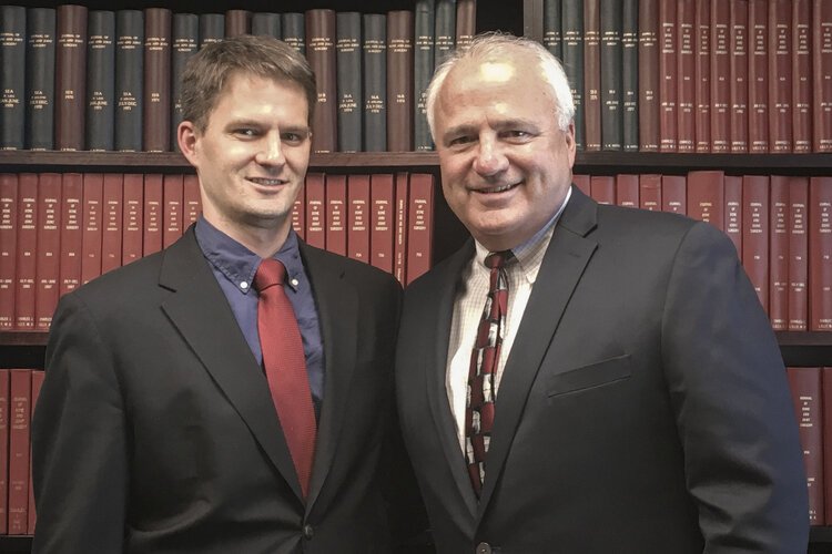 Dr. Ryan J. Lilly and his father, Dr. Charles J. Lilly, are both orthopaedic surgeons at McLaren Central Michigan.