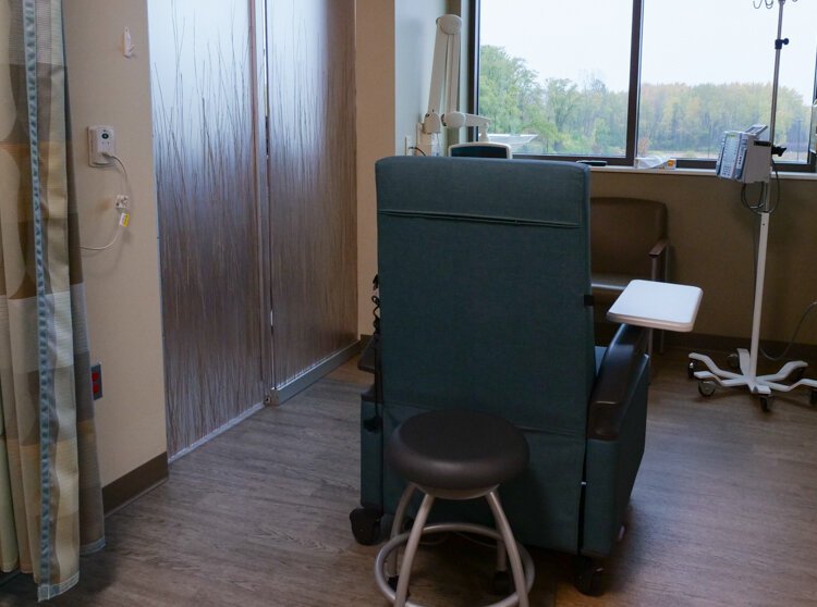 The treatment rooms in the Cancer and Infusion Center at MidMichigan Medical Center – Mt. Pleasant feature a window, state-of-the-art heated and massage chairs, seat for a guest, and the ability to open a sliding door to talk with fellow patients.