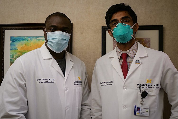 Utibe Effiong, M.D., M.P.H., internal medicine physician and primary care dyad leader, MidMichigan Health, alongside Internal Medicine Physician Jinu Puthenparampil, M.D., at MidMichigan Medical Center – Mt. Pleasant.