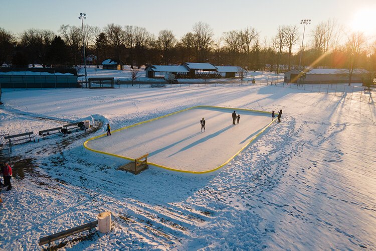 The seasonal ice-skating rink is located on N. Main Street in Mt. Pleasant's Island Park at the Kaye Bouck Youth Softball Field just north of the tennis courts.