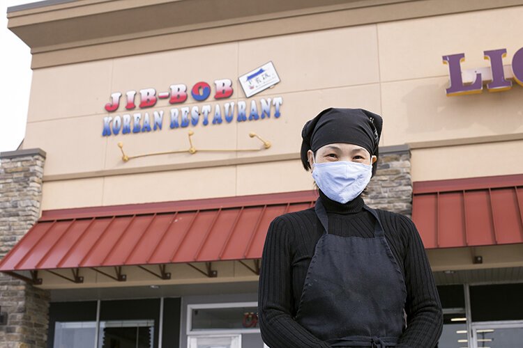 Owner Maya Denslow poses for a photo on Feb. 17, 2021, outside of what is now the former location of Jib-Bob Korean Restaurant on N. Mission St. in Mt. Pleasant.