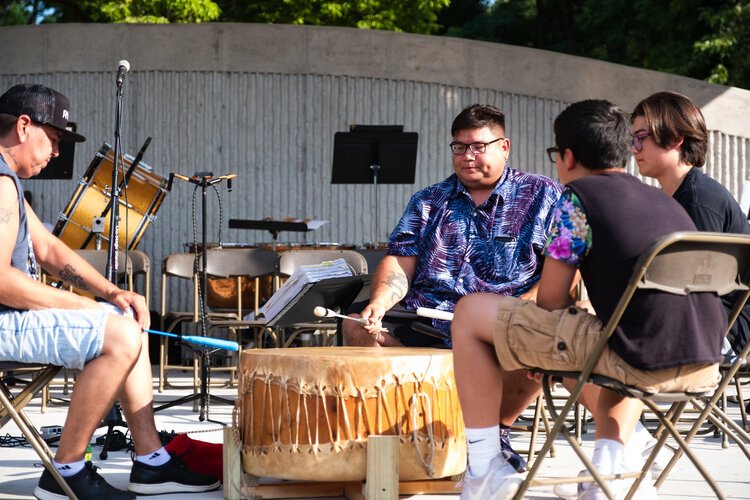 Onion Creek Drummers from the Saginaw Chippewa Indian Tribe perform at the Island Park Arts Pavilion's inaugural concert on Monday, Aug. 5.