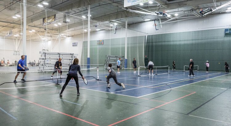 The Mount Pleasant Pickleball Group sets up three courts at each group meeting, allowing 12 members to play at a time at Morey Courts.