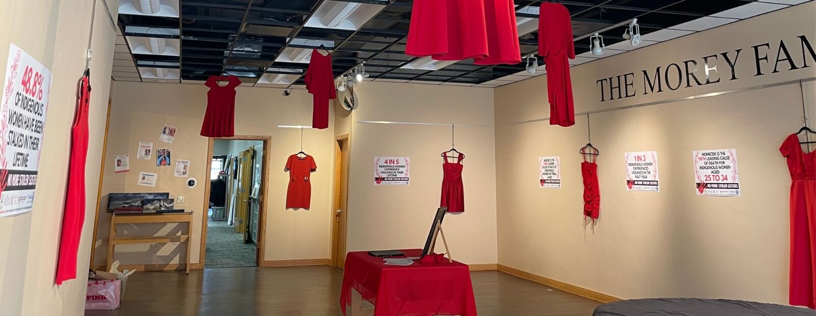 Red Dresses Exhibit in downtown Mt. Pleasant's Art Reach